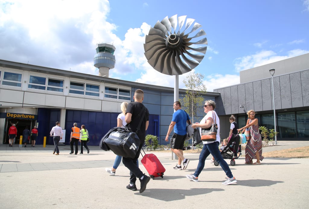 East Midlands Airport departures entrance, terminal and aircraft engine sculpture